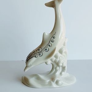 Lenox diving Dolphin 7 in tall 5 in wide. White porcelain cobalt blue and gold.